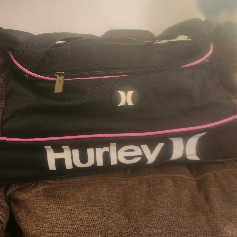 Hurley Black and Pink Travel Bag with Durable Design
